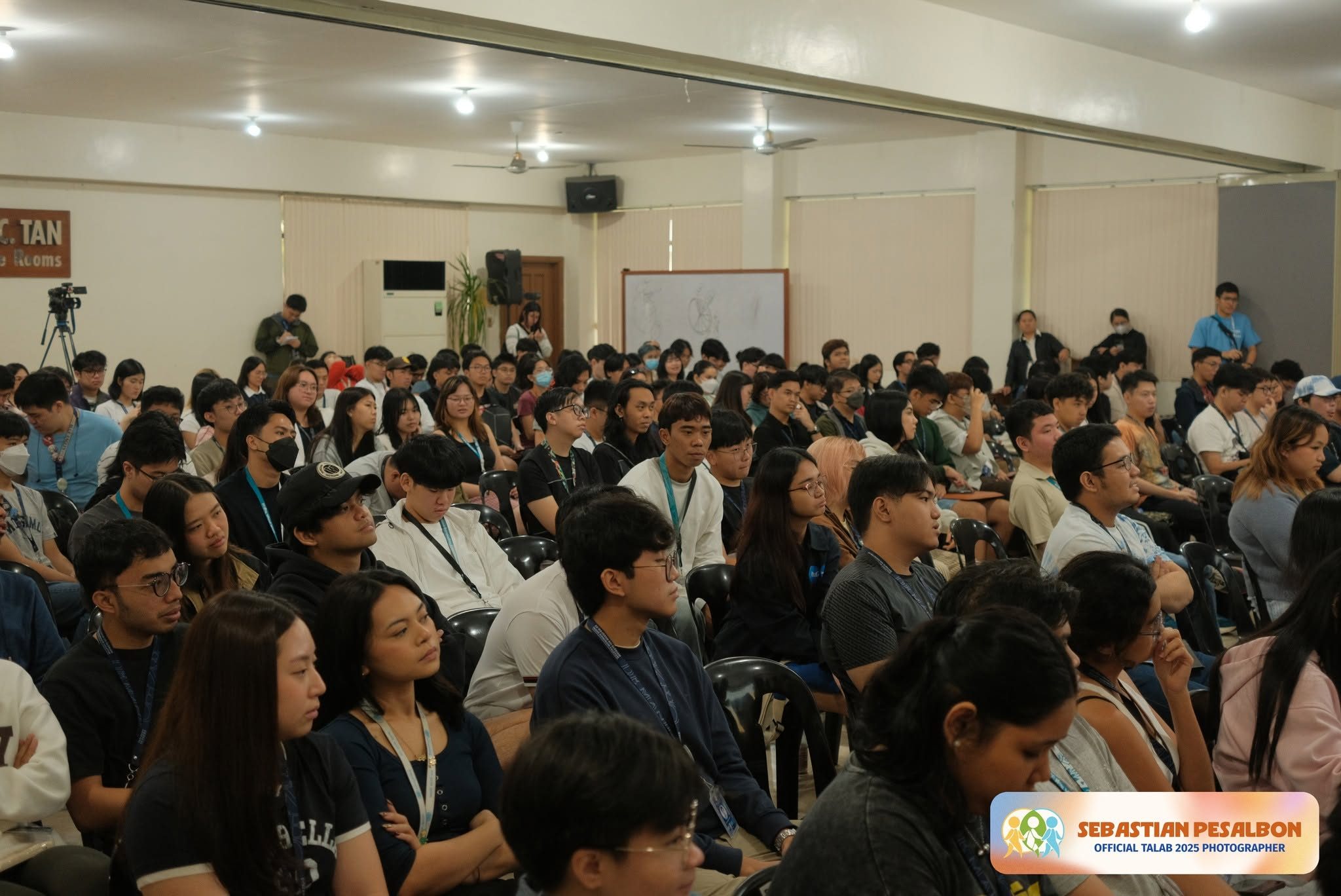 TALAB organizers and guests standing together during closing remarks